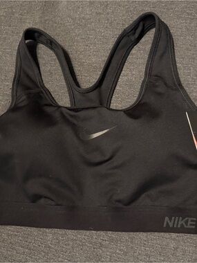 Nike Black Women's Racerback Sports Bra with Subtle Swoosh